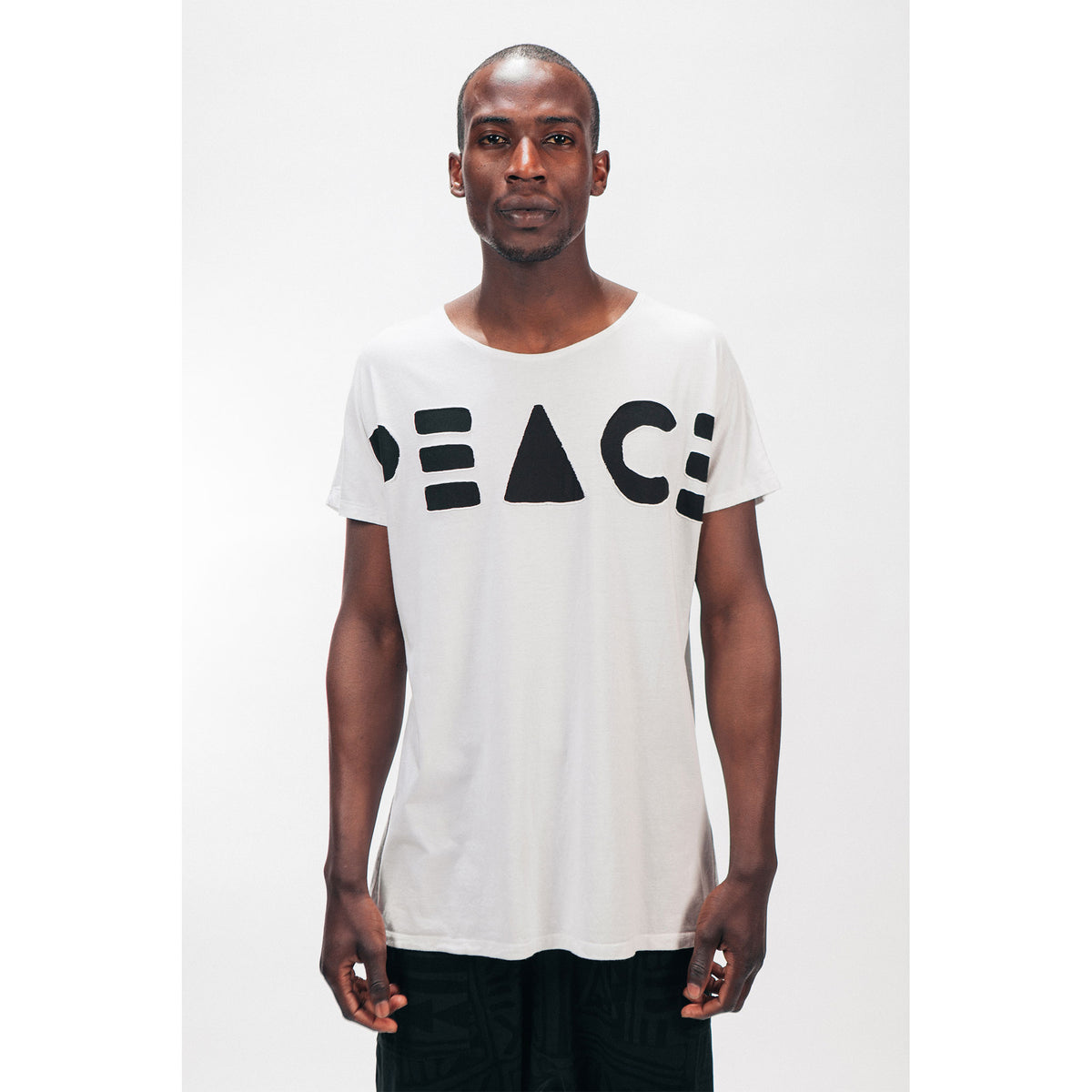 LONGLINE SINGLE PANEL TEE [PEACE CUTOUT] | PEACE FITS